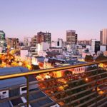 The Studios - View over city at dusk