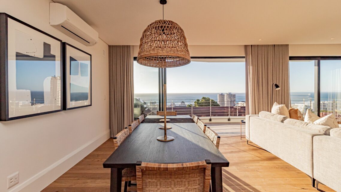 Alpha Sunsets - Indoor dining area with view