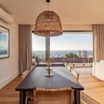 Alpha Sunsets - Indoor dining area with view