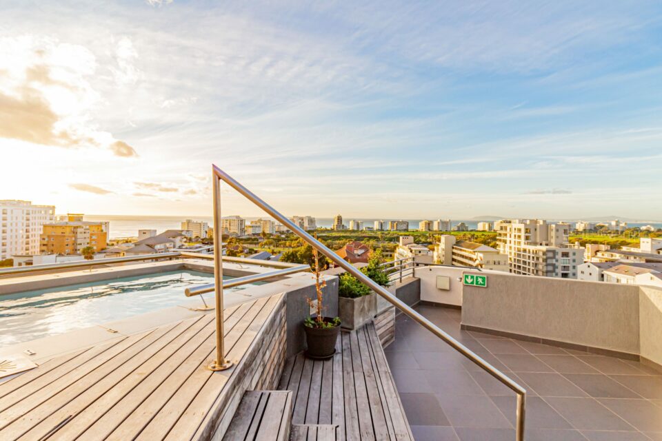 Scholtz Penthouse - Upper deck with pool and views