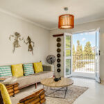 Eastern Views - Living room with balcony