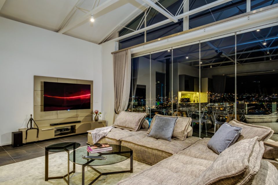 Mithras House - Living room with TV