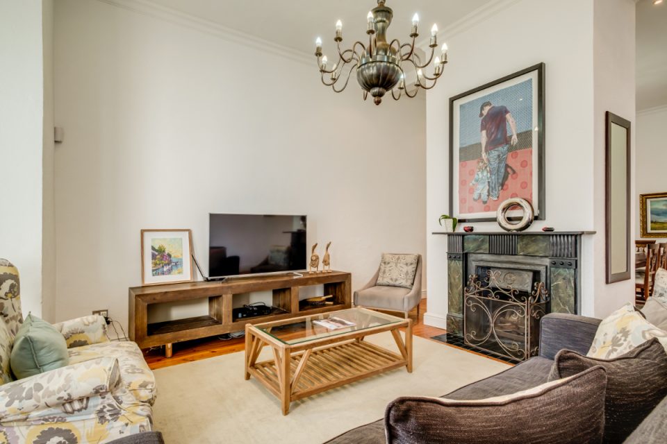 Sea Point Haven - Living room with fireplace