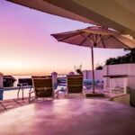 Alpha on the Bay - Pool deck with views